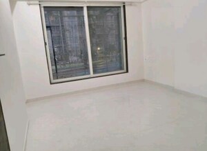 Room in 2 BHK Apartment at Gurukrupa Marina Enclave, Malad West – for Rent