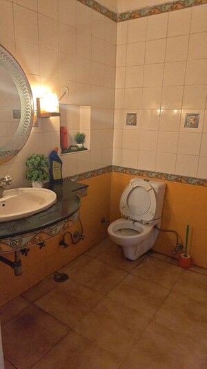 Bathroom in 3.5 BHK Builder Floor at Patel Nagar – for Sale