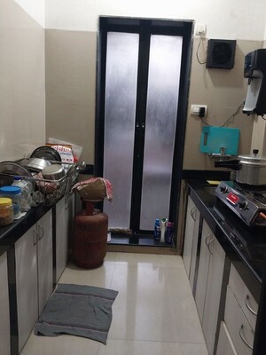 Kitchen in 1 BHK Apartment at K Raheja Raheja Residency, Malad East – for Sale