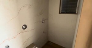 Bathroom in 1 BHK Apartment at Squarefeet Green Square, Parkwoods – for Sale