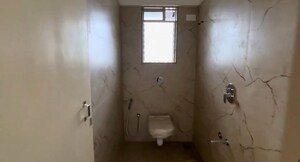 Bathroom in 1 BHK Apartment at Squarefeet Green Square, Parkwoods – for Sale