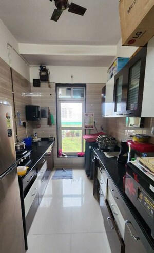 Kitchen in 2 BHK Apartment at Sheth Vasant Lawns, Laxmi Nagar – for Rent