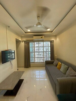 Living Room in 1 BHK Apartment at Khar West – for Rent