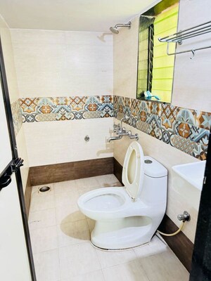 Attached Bathroom in 2 BHK Apartment at Virat Green Avenue, Shilphata – for Rent