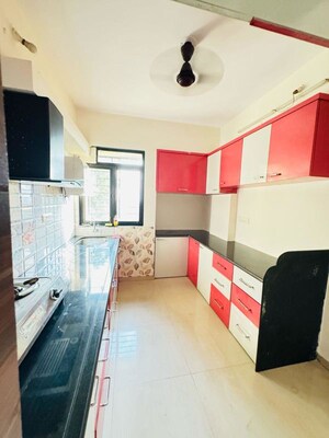 Kitchen in 2 BHK Apartment at Virat Green Avenue, Shilphata – for Rent