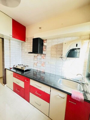 Kitchen in 2 BHK Apartment at Virat Green Avenue, Shilphata – for Rent