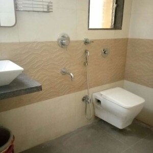 Bathroom in 2 BHK Apartment at Man SN Saket CHS, Goregaon West – for Rent
