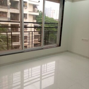 Room in 2 BHK Apartment at Man SN Saket CHS, Goregaon West – for Rent