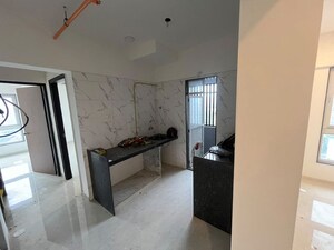 Kitchen in 2 BHK Apartment at Shreeji Plaza, Malad West – for Rent