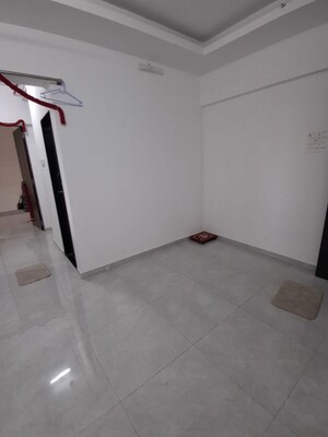 Living Room in 2 BHK Apartment at Unique Sky City, Virar East – for Rent