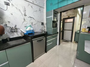 Kitchen in 2 BHK Apartment at Sanghvi Valley, Kalwa – for Sale