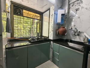 Kitchen in 2 BHK Apartment at Sanghvi Valley, Kalwa – for Sale
