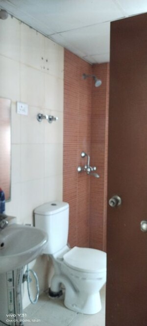 Bathroom in 3 BHK Apartment at Mahagun My Woods, Sector 16c Greater Noida – for Rent