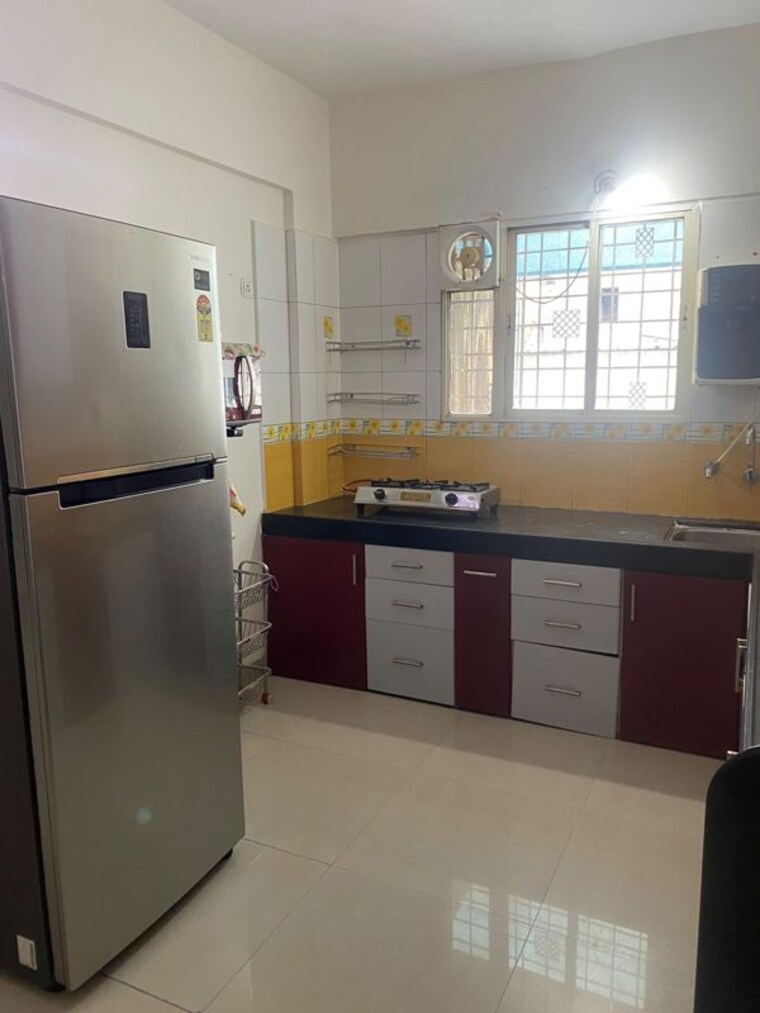 Kitchen, royal-imperio 2 Bedroom 850 Sq.Ft. Apartment In Pimple Saudagar Pune 10721121