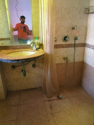 Bathroom in 2 BHK Apartment at Royal Palms, Goregaon East – for Rent