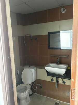 Bathroom in 3 BHK Apartment at Mahagun My Woods, Sector 16c Greater Noida – for Rent