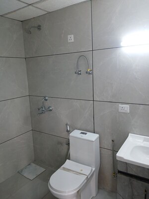 Bathroom in 2 BHK Apartment at JKG Palm Resort, Raj Nagar Extension – for Sale