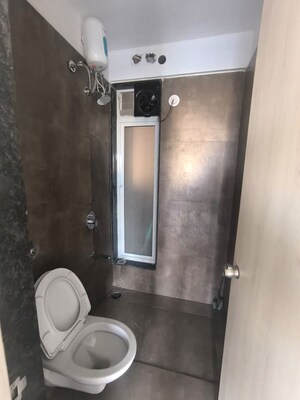 Bathroom in 3 BHK Apartment at Sukhwani Kingsley, Thergaon – for Rent