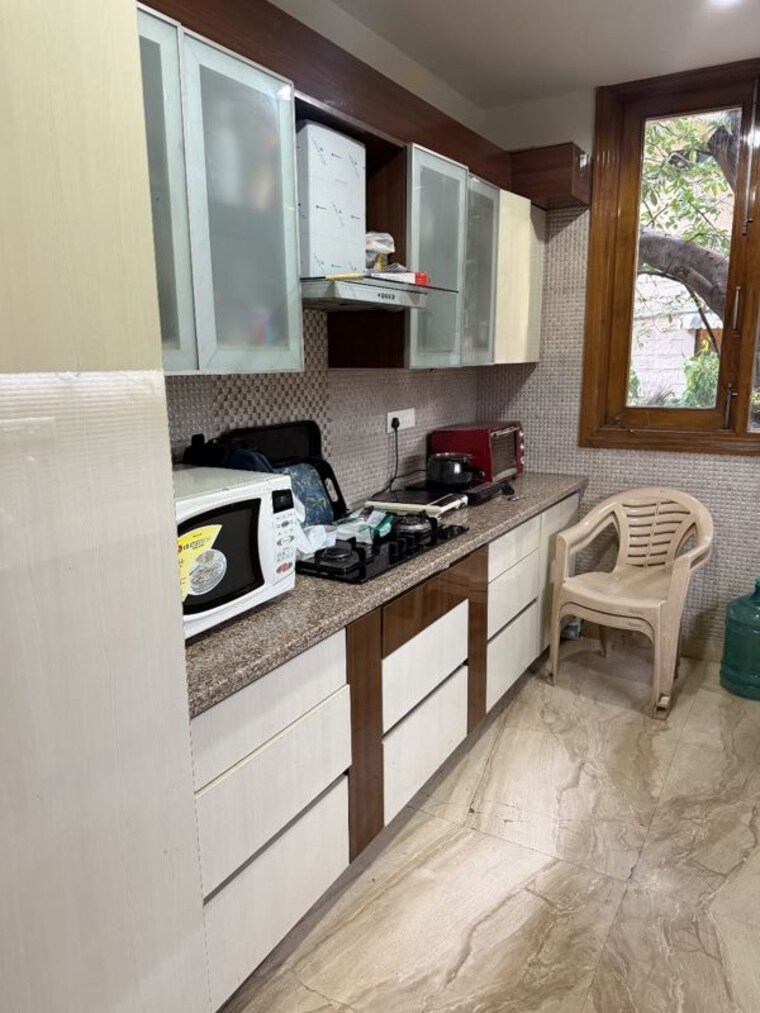 Kitchen, south extension ii 3 Bedroom 315 Sq.Yd. Builder Floor In South Extension ii Delhi 10721240