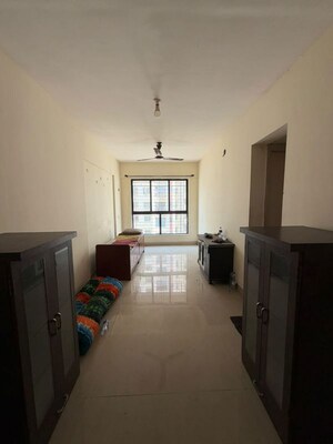 Living Room in 1 BHK Apartment at Lodha Crown Taloja Quality Homes, Dombivli East – for Rent