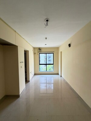 Living Room in 1 BHK Apartment at Lodha Crown Taloja Quality Homes, Dombivli East – for Rent