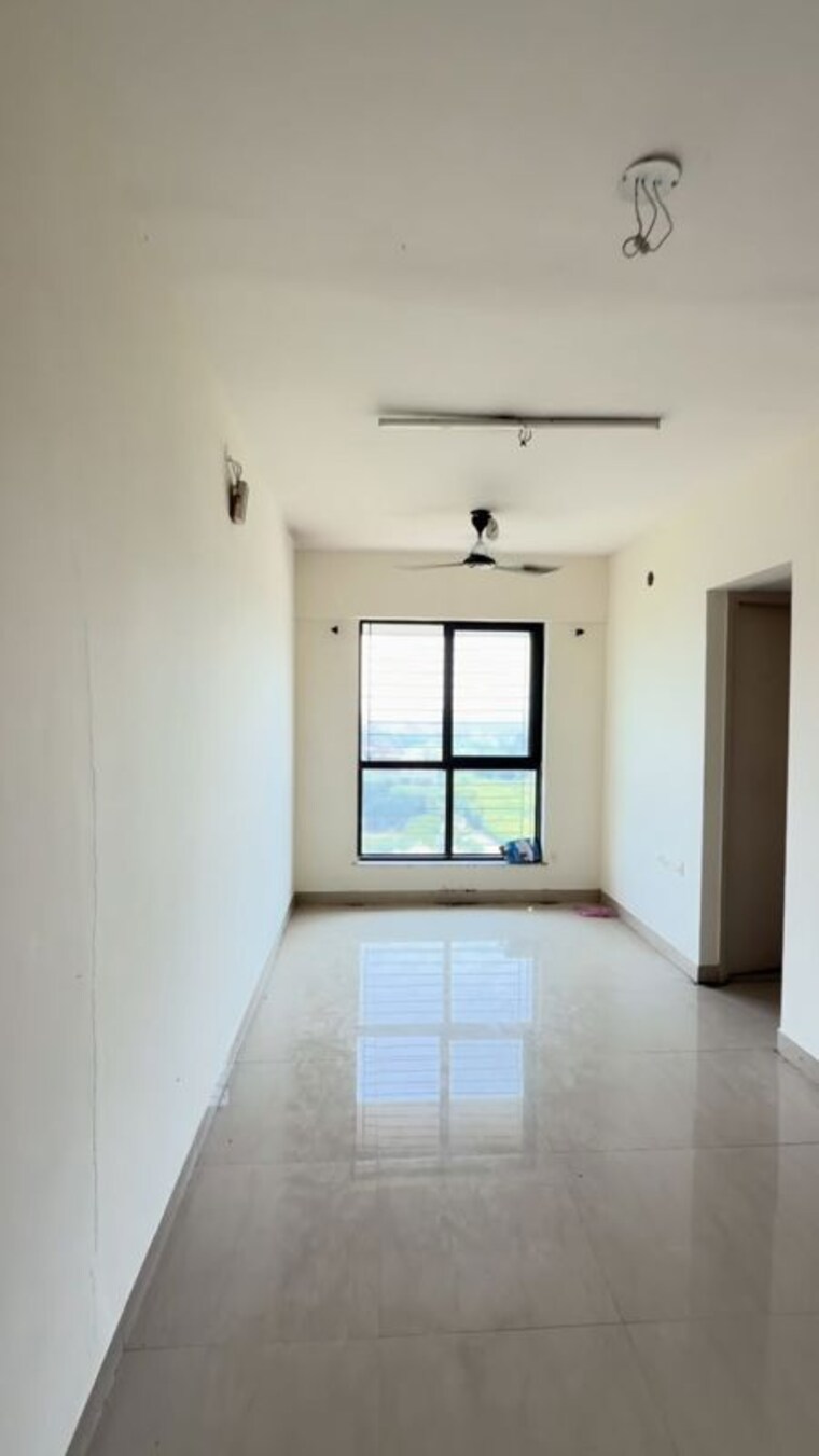 Living Room, lodha-crown-jasmine-d-e-and-f 1 Bedroom 305 Sq.Ft. Apartment In Dombivli East Thane 10721313