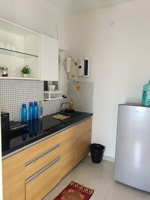 Kitchen in 1 BHK Apartment at Omkar Signet, Malad East – for Rent