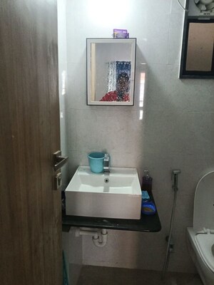 Bathroom in 3 BHK Apartment at Kohinoor Viva City, Dhanori – for Rent