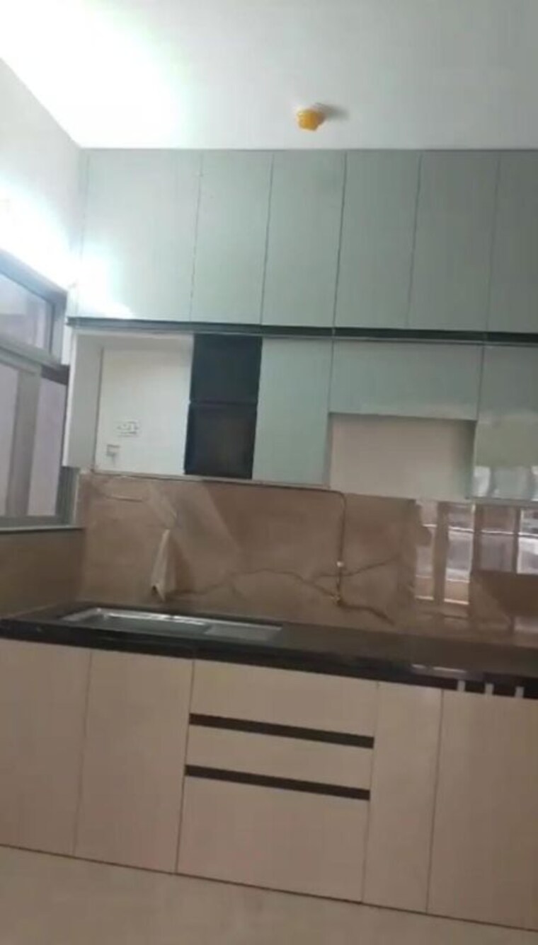 Kitchen, kolte-patil-life-republic-aros 3 Bedroom 1137 Sq.Ft. Apartment In Hinjewadi Pune 10721211