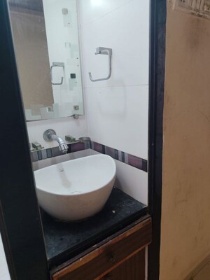 Bathroom in 2 BHK Apartment at Evershine Park, Andheri West – for Rent