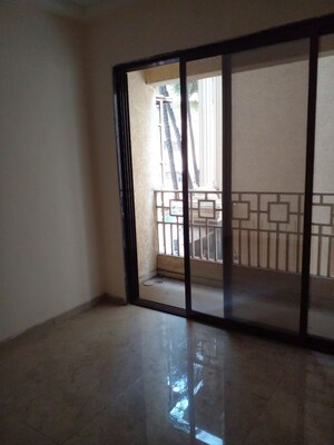 Room in 2 BHK Apartment at Tulsi Park, Khadakpada – for Sale