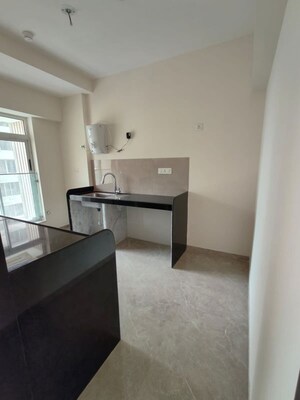 Kitchen in 2 BHK Apartment at Transcon Triumph Tower, Andheri West – for Sale