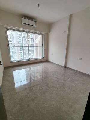 Room in 2 BHK Apartment at Transcon Triumph Tower, Andheri West – for Sale