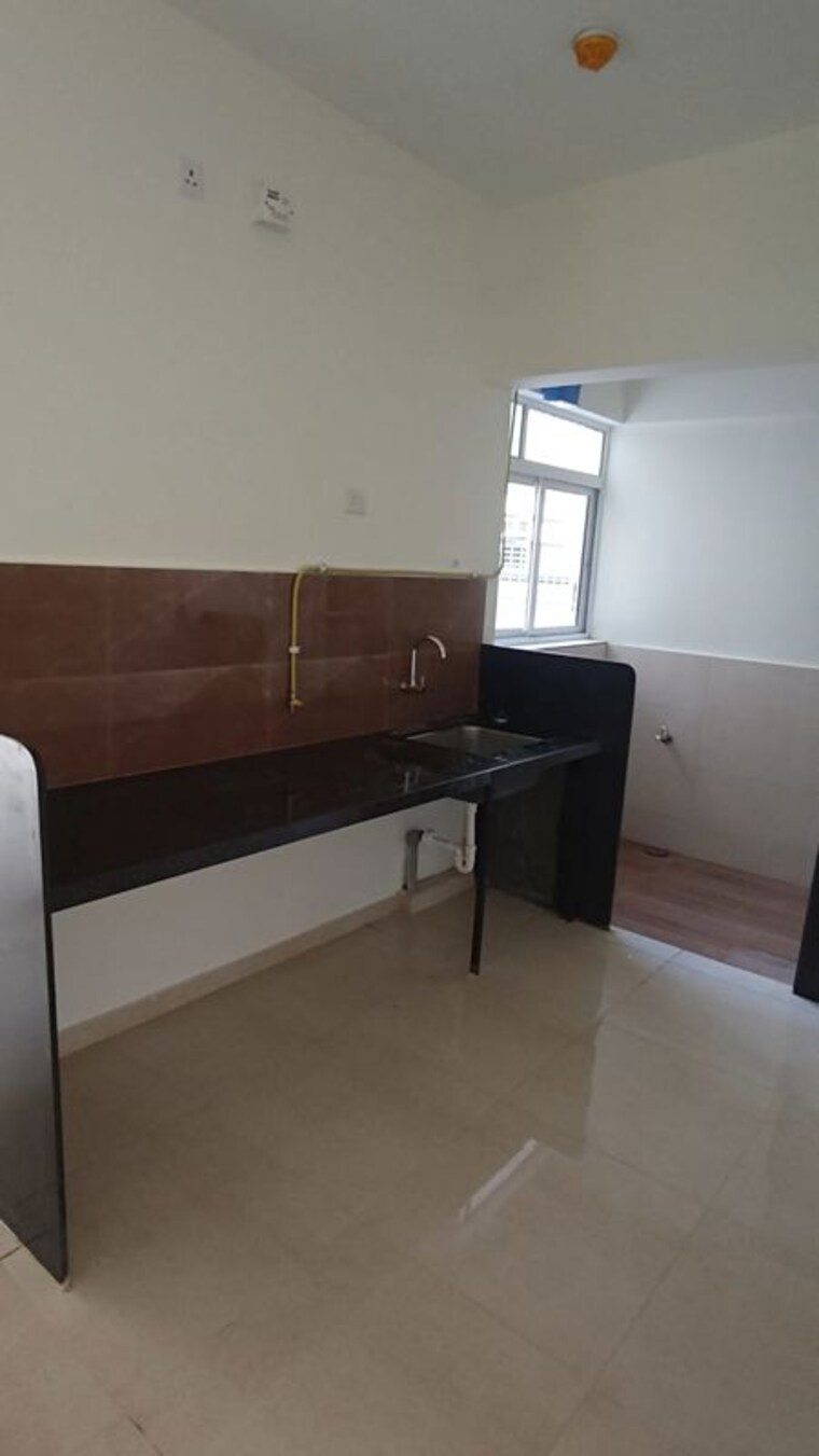 Kitchen, kolte-patil-life-republic 2 Bedroom 801 Sq.Ft. Apartment In Hinjewadi Pune 10721581