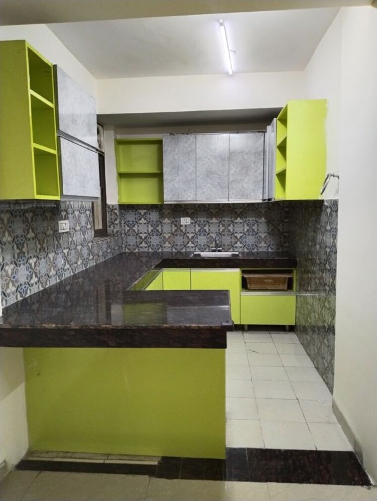Kitchen, unitech-uniworld-gardens-2 2 Bedroom 937 Sq.Ft. Apartment In Sector 47 Gurgaon 10721602