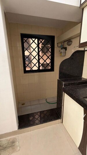 Kitchen in 2 BHK Apartment at Lakashchandi CHS, Goregaon East – for Rent