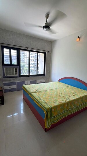 Bedroom in 2 BHK Apartment at Lakashchandi CHS, Goregaon East – for Rent