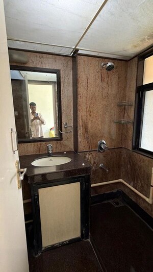 Bathroom in 2 BHK Apartment at Lakashchandi CHS, Goregaon East – for Rent