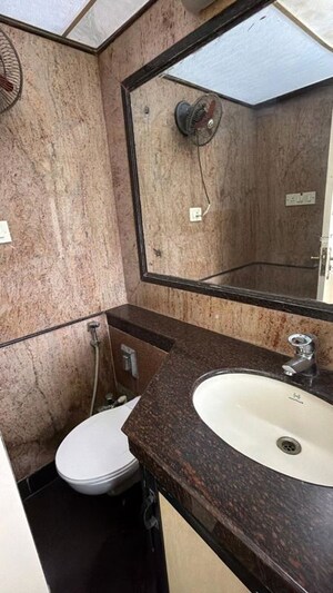Bathroom in 2 BHK Apartment at Lakashchandi CHS, Goregaon East – for Rent