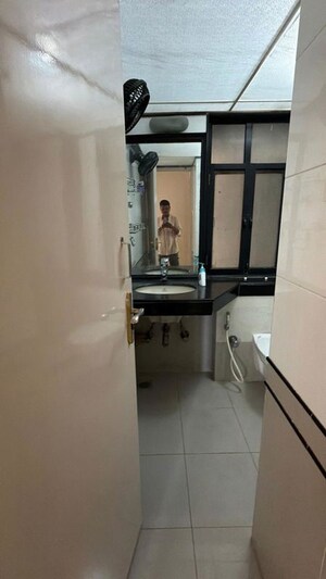 Bathroom in 2 BHK Apartment at Lakashchandi CHS, Goregaon East – for Rent