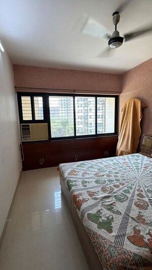 Bedroom in 2 BHK Apartment at Lakashchandi CHS, Goregaon East – for Rent