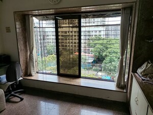 Room in 1 BHK Apartment at Akshardham Apartment, Malad West – for Rent