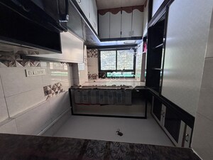 Kitchen in 1 BHK Apartment at RNA NG Regency Phase I, Balkum Pada – for Rent