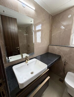 Bathroom in 3 BHK Apartment at Smart World Orchard, Sector 61 – for Rent