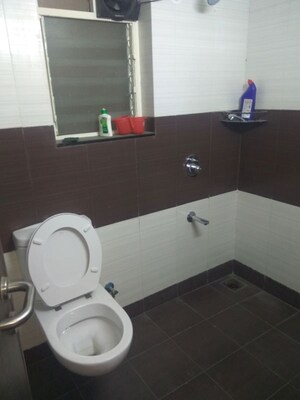 Bathroom in 3 BHK Apartment at Paranjape Schemes Yuthika, Baner – for Rent