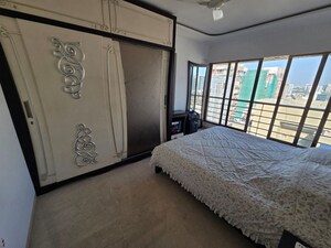 Bedroom in 3 BHK Apartment at Shree Sai D N Nagar Shivneri CHS Ltd, Andheri West – for Rent