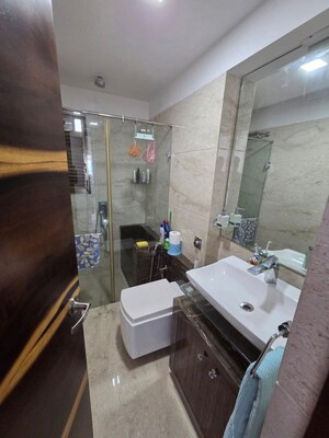 Bathroom in 3 BHK Apartment at Shree Sai D N Nagar Shivneri CHS Ltd, Andheri West – for Rent