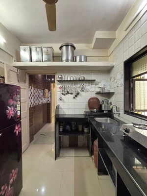Kitchen in 2 BHK Apartment at Madhav Sansar, Kalyan West – for Sale
