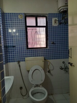 Bathroom in 3 BHK Apartment at Raviraj Yellow Blossoms, Ghorpadi – for Rent