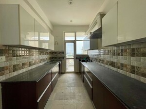 Kitchen in 3 BHK Apartment at Sushma Crescent, Dhakoli – for Sale